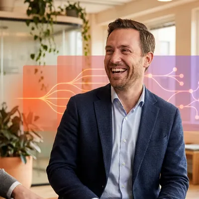 Two smiling businessmen in an office with a glowing digital network graphic overlay.