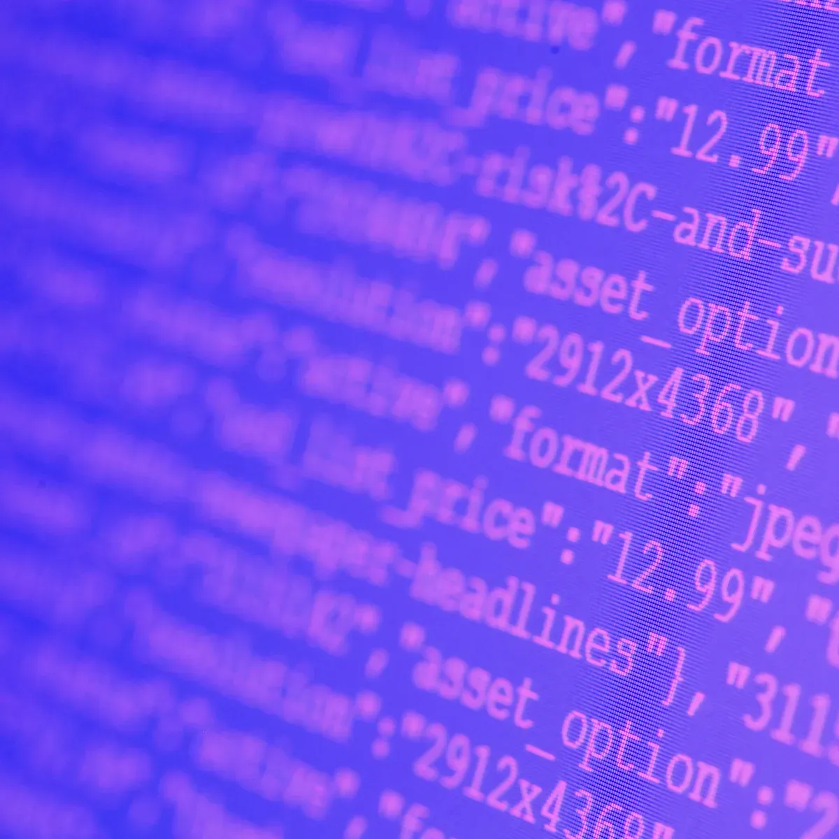 Lines of code on a screen in a purple color tone