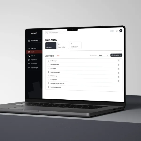 Laptop displays the home page of the “swiDOC” archiving software for Swiss SMEs.
